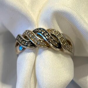 Silver (925) and (presumably fake) diamond ring with champagne/chocolate…